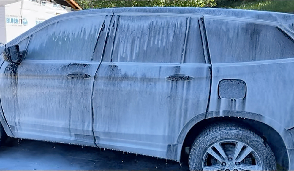 Vehicle covered in foam bath